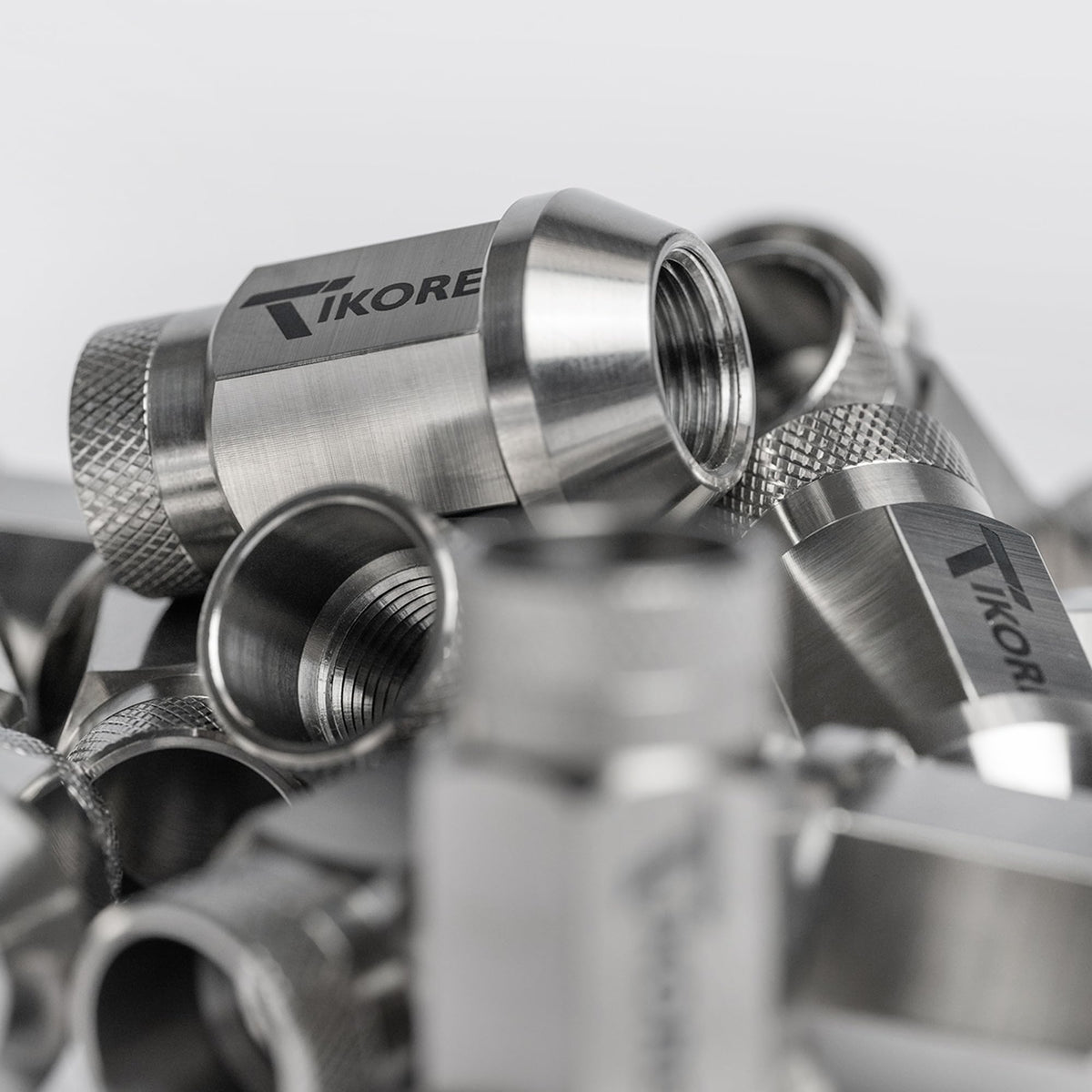 TK40 Lug Nut Set Open Conical M12x1.25 Standard Finish Tikore Logo 20pcs - TK-OC1212-ST20